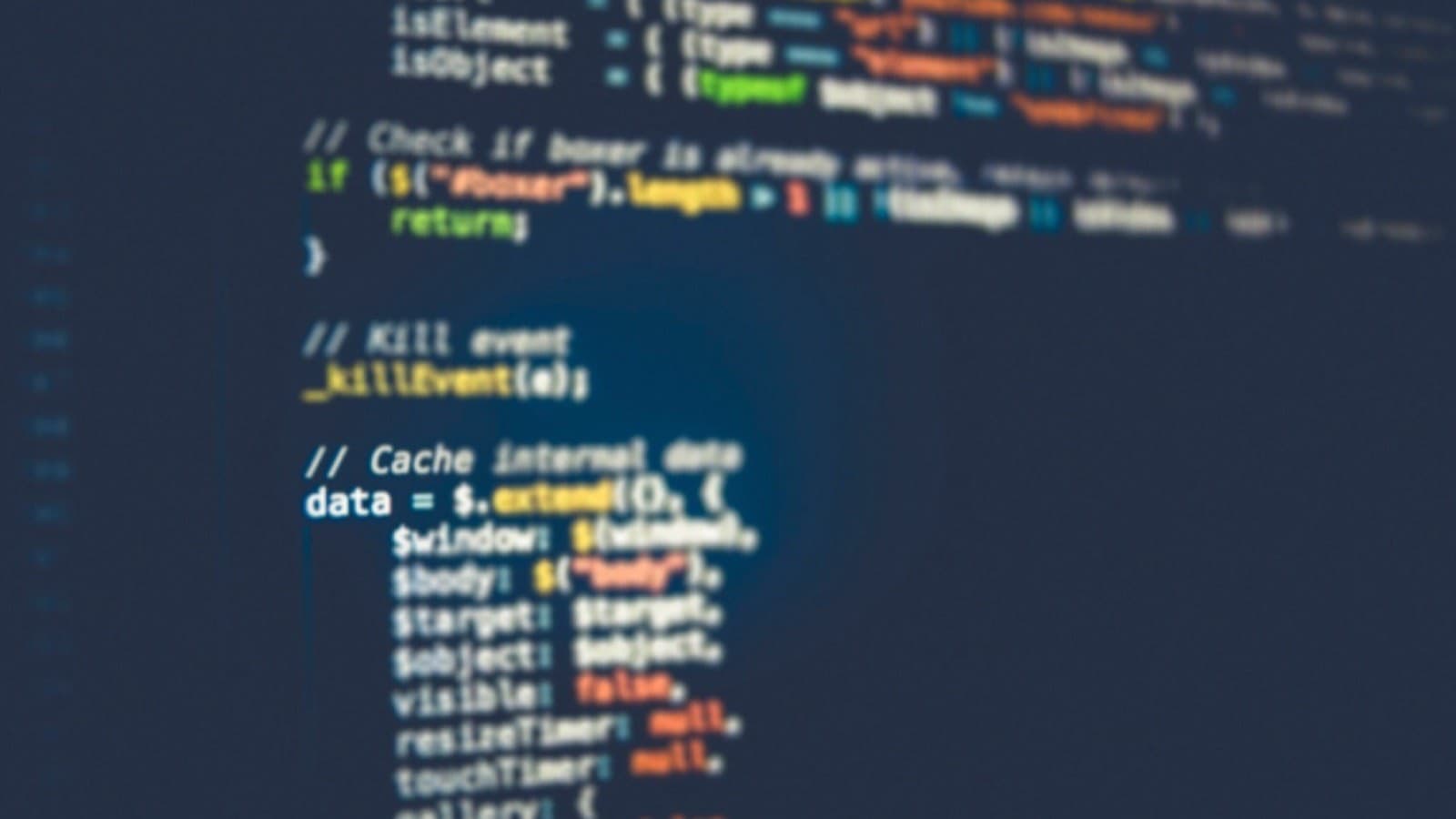 Lines of source code on a dark computer screen